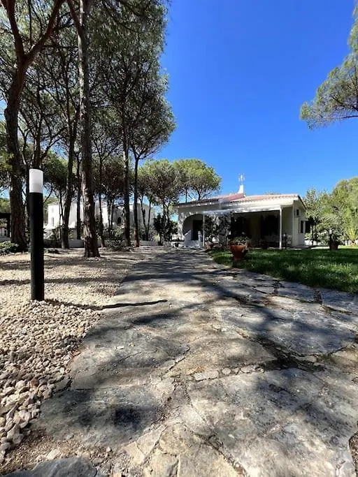 Casa de Férias Villa Immersa Nel Verde A 150Mt Dal Mare Adiacente Al Forte Village Resort Itália